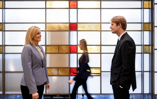 Lla employees having conversation