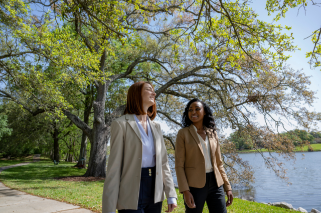LLA staff members walking on campus