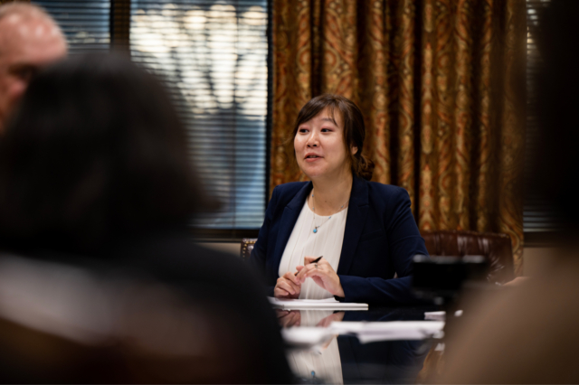 Nora in meeting